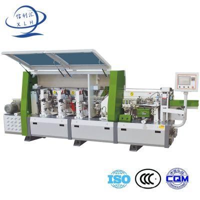 Automatic Edge Bonding Machine with Gluing with Top and Bottom Trimming, Corner Trimming, Scrapping, Spray Cleaning and Buffing
