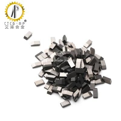 Solid extruded tungsten carbide saw tips